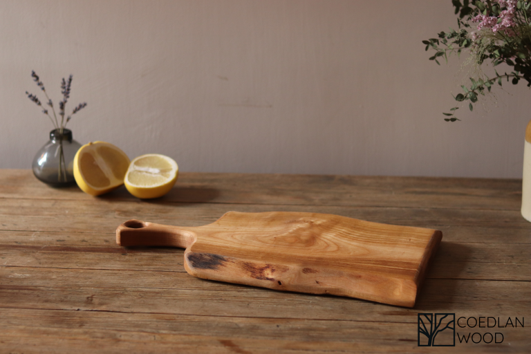 Small cherry live edge chopping board with handle